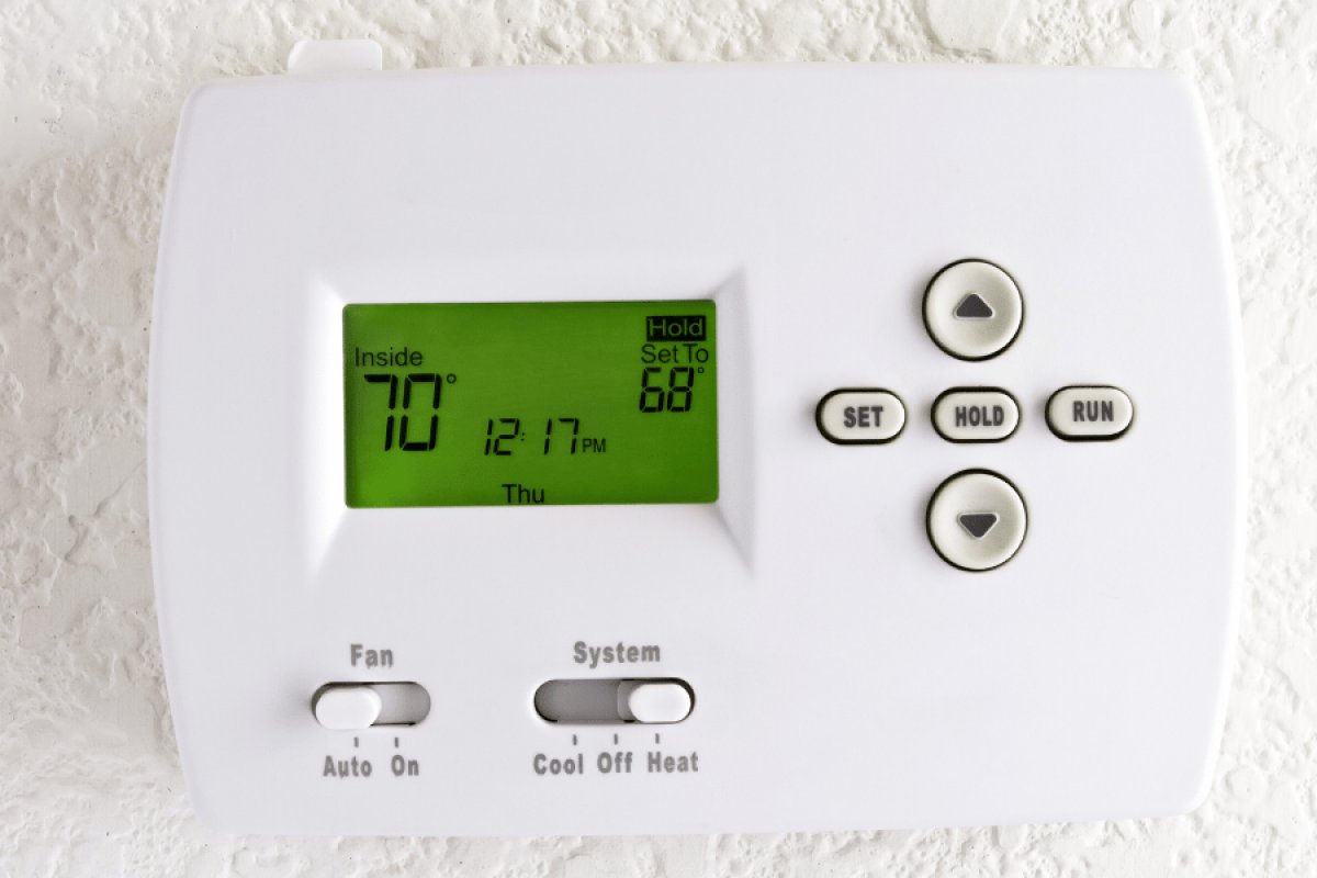 Programmable thermostat set to 70 degrees for summer comfort and lower energy bills