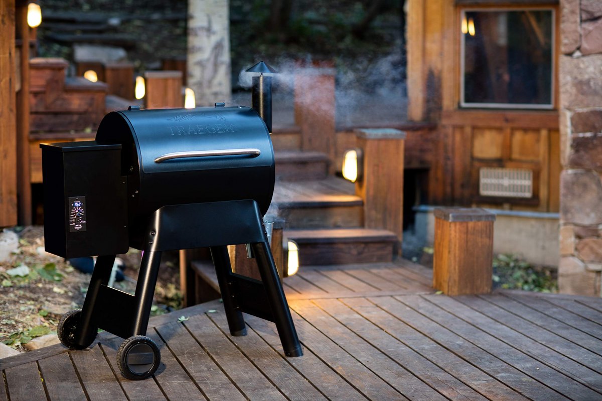 Traeger wood pellet grill smoking pulled pork for a tailgate cookout in Endicott NY